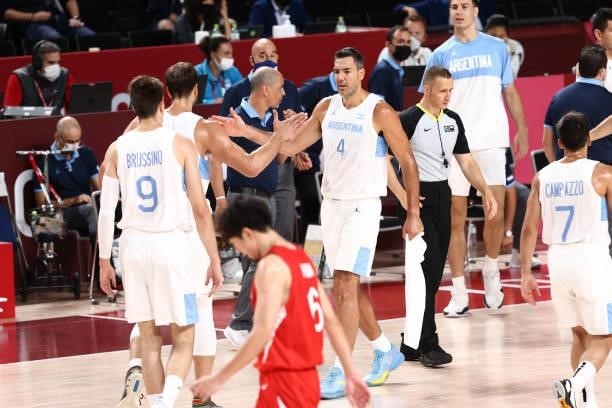 Luis Scola of Team Argentina high fives his teammates during the game against Japan at Saitama Super Arena during the 2020 Tokyo Olympics on August...