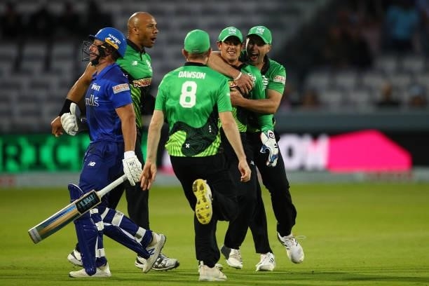 Quinton de Kock of Southern Brave celebrates with team mates after catching Josh Inglis of London Spirit during The Hundred match between London...