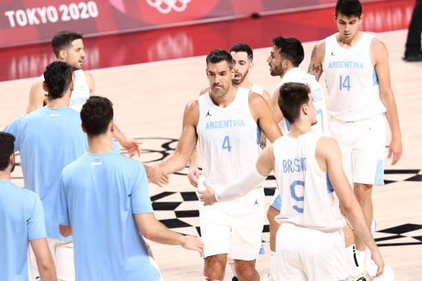 Luis Scola of Team Argentina high fives his teammates during the game against Japan at Saitama Super Arena during the 2020 Tokyo Olympics on August...