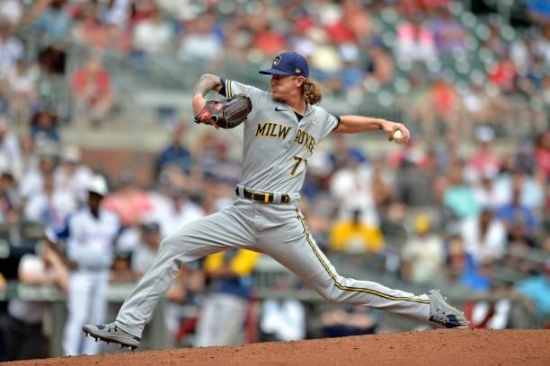 Josh Hader of the Milwaukee Brewers pitches in the ninth inning against the Atlanta Braves at Truist Park on August 1, 2021 in Atlanta, Georgia.