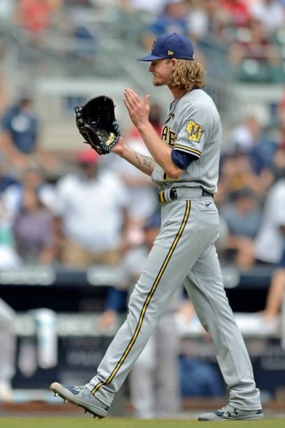Josh Hader of the Milwaukee Brewers walks off the pitcher's mound after winning against the Atlanta Braves at Truist Park on August 1, 2021 in...