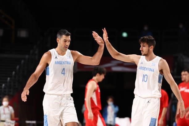 Luis Scola and Leandro Nicolas Bolmaro high five during the game against Japan at Saitama Super Arena during the 2020 Tokyo Olympics on August 1,...