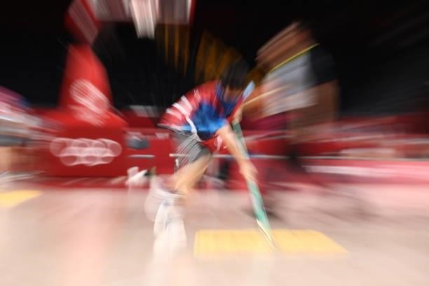 Worker sweeps the floor during the game between Japan and Argentina at Saitama Super Arena during the 2020 Tokyo Olympics on August 1, 2021 in...