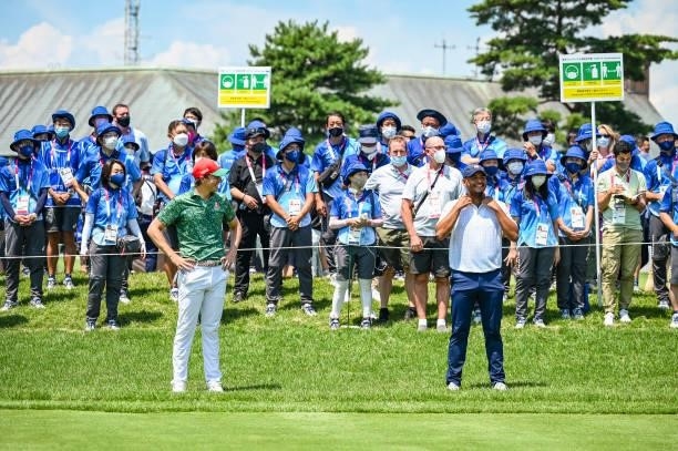 Sebastian Munoz of Team Colombia and Carlos Ortiz of Team Mexico smile on the first tee during the final round of Mens Individual Stroke Play Golf on...