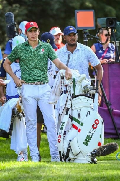 Carlos Ortiz of Team Mexico and Sebastian Munoz of Team Colombia wait on the 16th tee during the final round of Mens Individual Stroke Play Golf on...