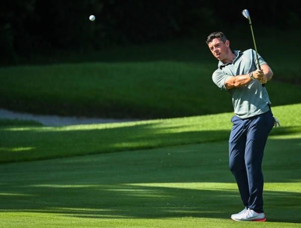 Rory McIlroy of Team Ireland chips a shot to the 17th hole green during the final round of Mens Individual Stroke Play Golf on day nine of the Tokyo...
