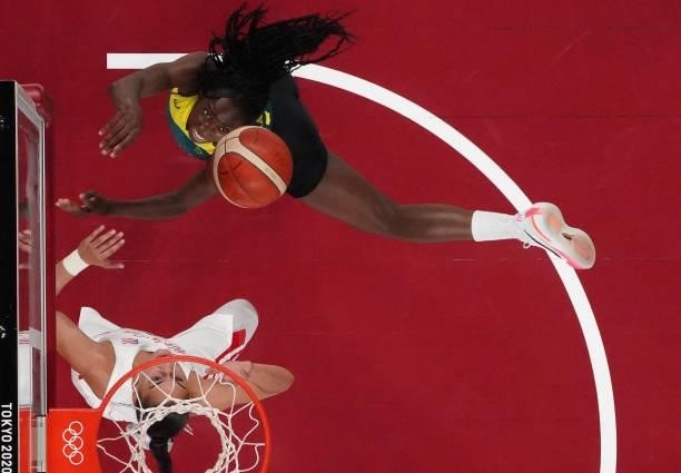 Australia's Ezi Magbegor goes to the basket in the women's preliminary round group C basketball match between Australia and Puerto Rico during the...