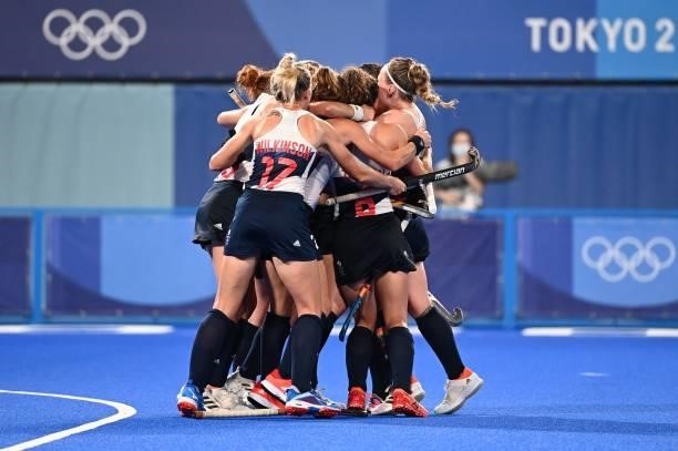 Players of Britain celebrate after teammate Fiona Anne Crackles scored the team's second goal against Spain during their women's quarter-final match...