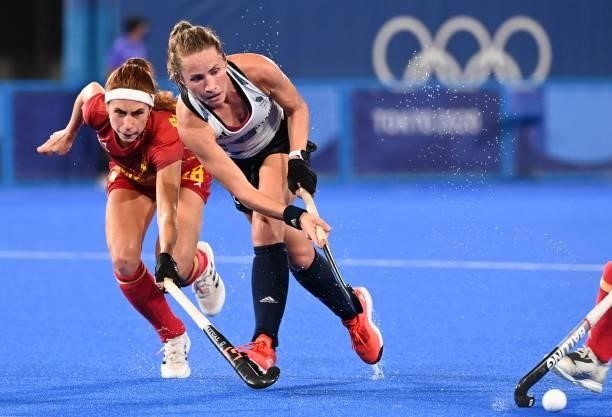 Spain's Begona Garcia and Britain's Shona McCallin vie for the ball during their women's quarter-final match of the Tokyo 2020 Olympic Games field...