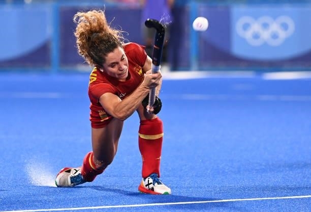 Spain's Georgina Oliva strikes the ball during the women's quarter-final match of the Tokyo 2020 Olympic Games field hockey competition against...