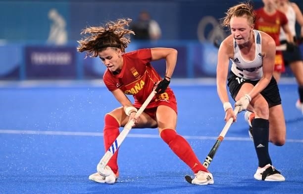 Spain's Lucia Jimenez is challenged by Britain's Isabelle Petter during their women's quarter-final match of the Tokyo 2020 Olympic Games field...