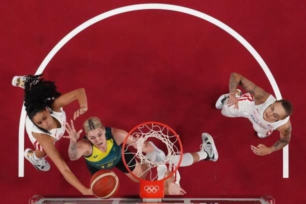 Puerto Rico's Isalys Quinones and Australia's Cayla George fight for the rebound in the women's preliminary round group C basketball match between...