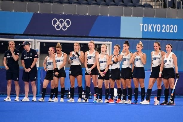 Players of Britain stand together during the penalty shoot-out against Spain after tying 2-2 in their women's quarter-final match of the Tokyo 2020...