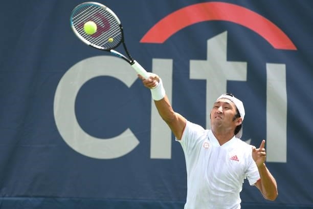 Yasutaka Uchiyama of Japan returns a shot during a match against Andreas Seppi of Italy on Day 3 during the Citi Open at Rock Creek Tennis Center on...