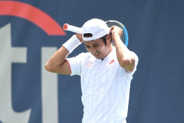 Yasutaka Uchiyama of Japan reacts to a shot during a match against Andreas Seppi of Italy on Day 3 during the Citi Open at Rock Creek Tennis Center...
