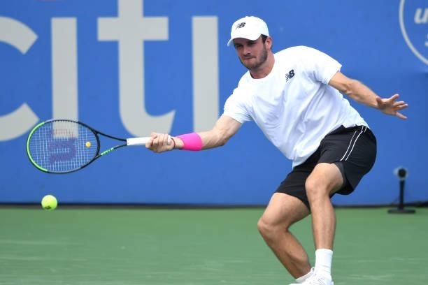 Tommy Paul of the United States returns a shot during a match against Daniel Elahi Galán of Colombia on Day 3 during the Citi Open at Rock Creek...