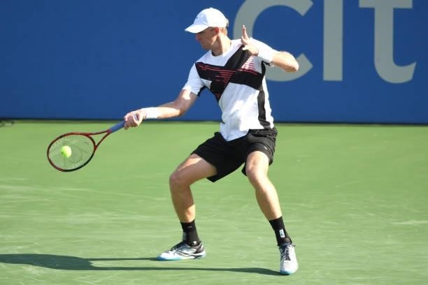 Kevin Anderson of South Africa returns a shot against Jenson Booksby of the United State on Day 3 during the Citi Open at Rock Creek Tennis Center on...