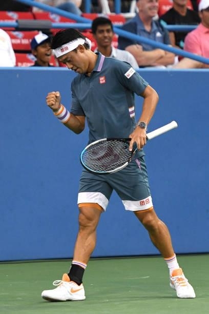 Kei Nishikori of Japan celebrates a shot against Sam Querrey of the United States on Day 3 during the Citi Open at Rock Creek Tennis Center on August...