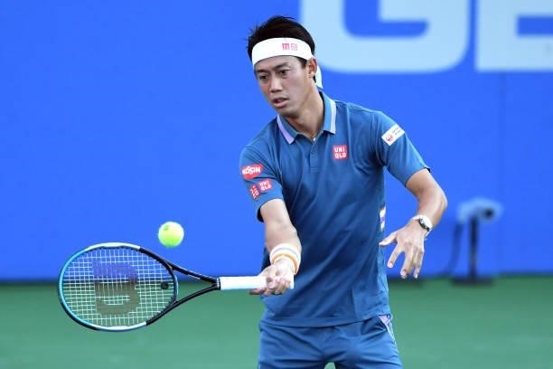Kei Nishikori of Japan returns a shot during a match against Sam Querrey of the United States on Day 3 of the Citi Open at Rock Creek Tennis Center...