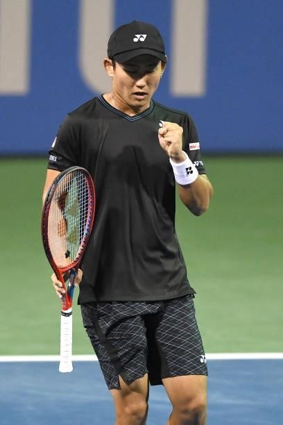 Yoshihito Nishioka of Japan celebrates a shot during a match against Jack Sock of the United States on Day 3 of the Citi Open at Rock Creek Tennis...