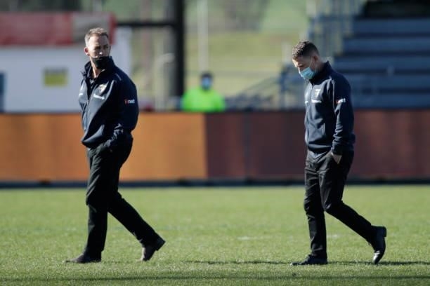 Alastair Clarkson, Senior Coach of the Hawks and Brendon Bolton, Assistant Coach of the Hawks inspect the ground before the 2021 AFL Round 20 match...