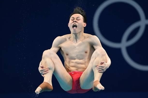 China's Xie Siyi competes to win the men's 3m springboard diving final event during the Tokyo 2020 Olympic Games at the Tokyo Aquatics Centre in...
