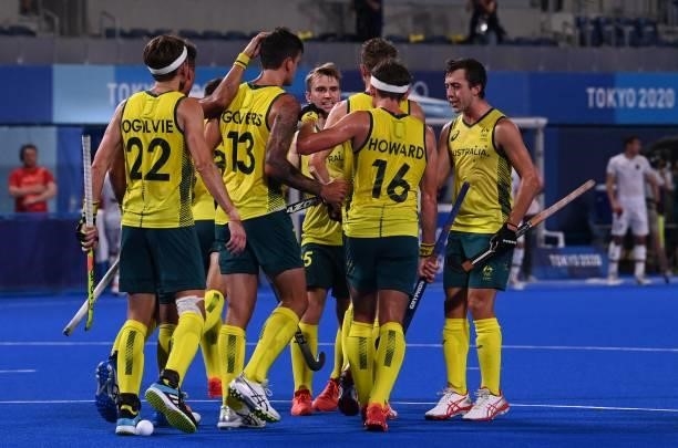 Australia's Blake Govers celebrates with teammates after scoring against Germany during their men's semi-final match of the Tokyo 2020 Olympic Games...