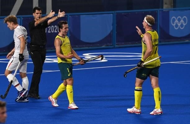 Australia's Lachlan Thomas Sharp celebrates with teammate Aran Zalewski after scoring against Germany during their men's semi-final match of the...