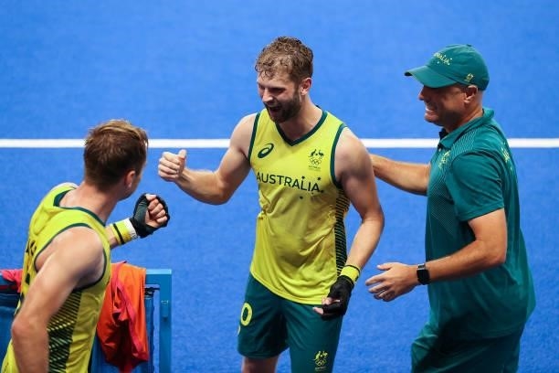 Joshua Beltz with teammate Joshua Simmonds of Team Australia celebrate victory in the Men's Semifinal match between Australia and Germany on day...