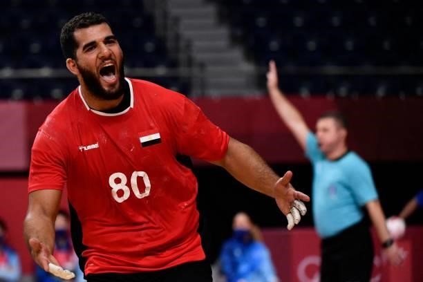 Egypt's pivot Ahmed Mesilhy celebrates after scoring during the men's quarterfinal handball match between Germany and Egypt of the Tokyo 2020 Olympic...