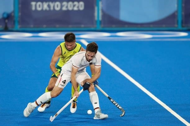 Lukas Windfeder of Team Germany and Tim rand of Team Australia battle for the ball during the Men's Semifinal match between Australia and Germany on...