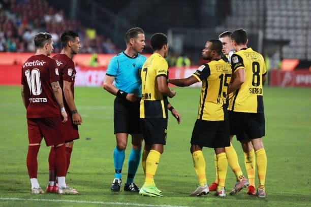 Players of Young Boys team protests to the referee during the UEFA Champions League Third Qualifying Round Leg One match between CFR Cluj and BSC...
