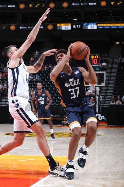 MaCio Teague of the Utah Jazz Blue drives to the basket during the 2021 Salt Lake City Summer League on August 3, 2021 at vivint.SmartHome Arena in...