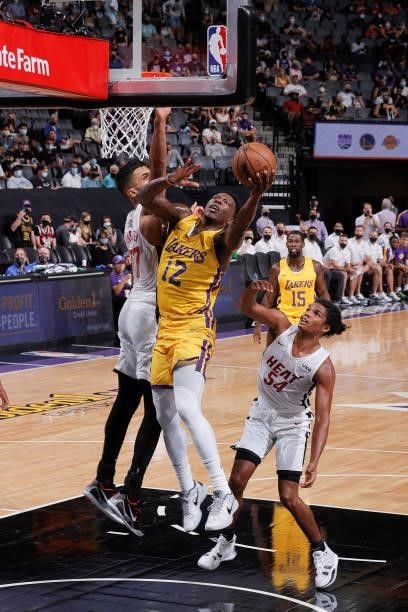 Devontae Cacok of the Los Angeles Lakers drives to the basket against the Miami Heat during the 2021 California Classic Summer League on August 3,...