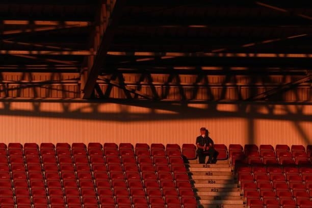 Fan from Cluj stands alone in the high tribune ahead the UEFA Champions League Third Qualifying Round Leg One match between CFR Cluj and BSC Young...