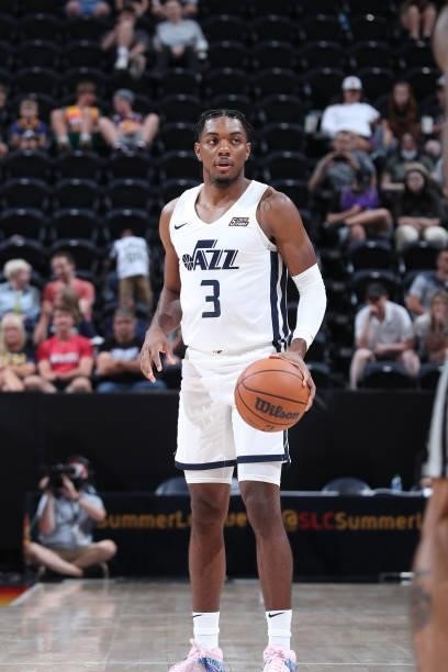 Trent Forrest of the Utah Jazz White handles the ball during the game against the San Antonio Spurs during the 2021 Salt Lake City Summer League on...