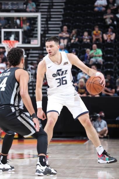Matt Mooney of the Utah Jazz White handles the ball against the San Antonio Spurs during the 2021 Salt Lake City Summer League on August 3, 2021 at...