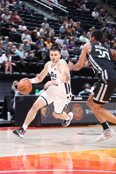 Matt Mooney of the Utah Jazz White drives to the basket against the San Antonio Spurs during the 2021 Salt Lake City Summer League on August 3, 2021...