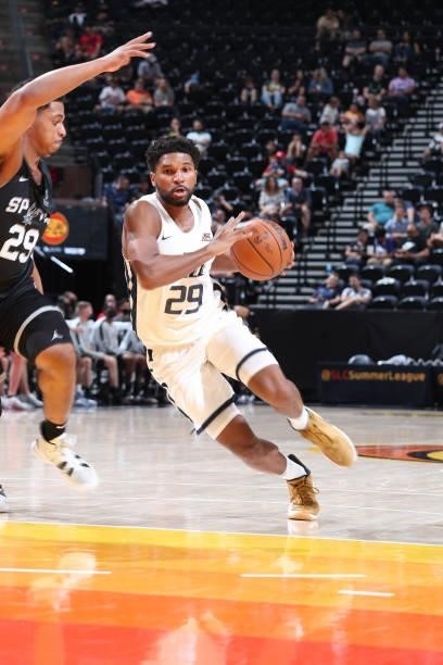 Kyle Castlin of the Utah Jazz White drives to the basket against the San Antonio Spurs during the 2021 Salt Lake City Summer League on August 3, 2021...