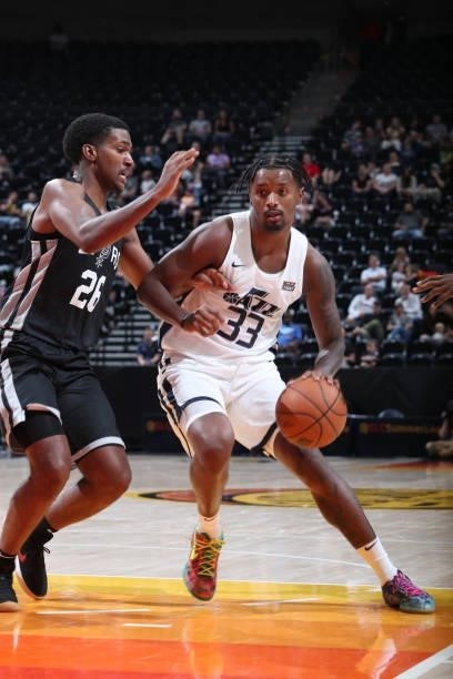 Elijah Hughes of the Utah Jazz White drives to the basket against the San Antonio Spurs during the 2021 Salt Lake City Summer League on August 3,...