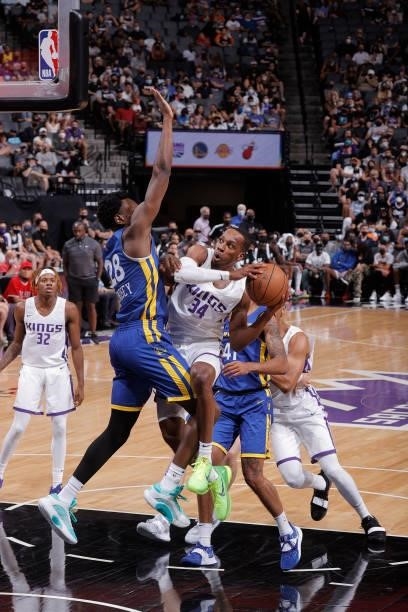 Matt Coleman of the Sacramento Kings drives to the basket against the Golden State Warriors during the 2021 California Classic Summer League on...
