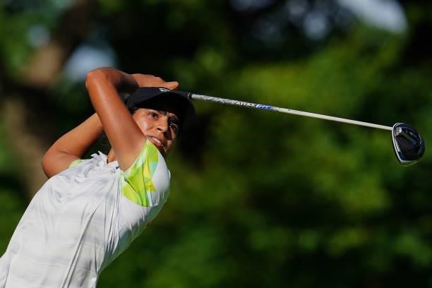 India's Diksha Dagar watches her drive from the 18th tee in round 1 of the womens golf individual stroke play during the Tokyo 2020 Olympic Games at...