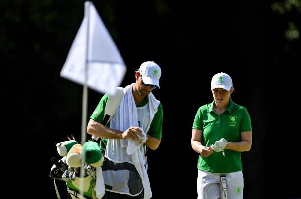 Saitama , Japan - 4 August 2021; Stephanie Meadow of Ireland with her caddie Kyle Kallan on the 15th green during round one of the women's individual...