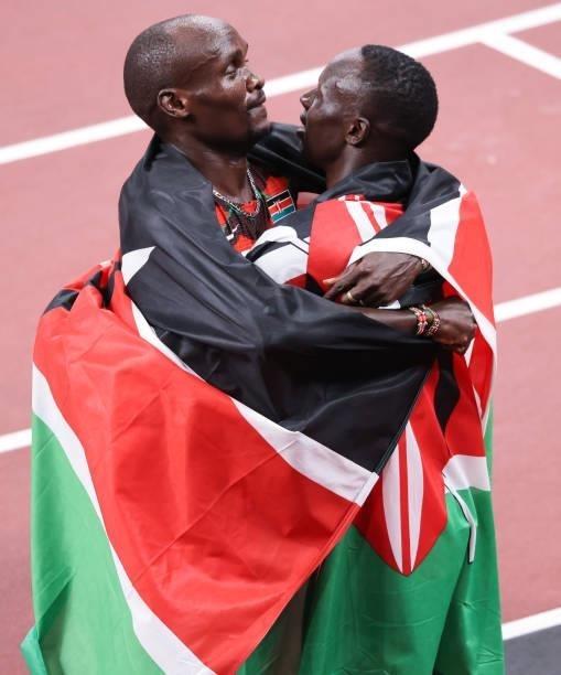 August 2021, Japan, Tokio: Athletics: Olympics, 800m, men, final, at the Olympic Stadium. Ferguson Cheruiyot Rotich of Kenya, and Emmanuel Kipkurui...