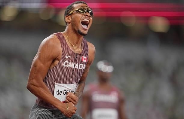 August 2021, Japan, Tokio: Athletics: Olympics, 200m, men, final, at the Olympic Stadium. Andre de Grasse of Canada cheers at the finish. Photo:...