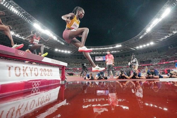 August 2021, Japan, Tokio: Athletics: Olympics, 3000m steeplechase, women, at the Olympic Stadium. Peruth Chemutai from Uganda in action. Photo:...