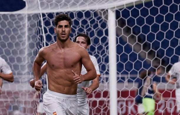 Marco Asensio of Spain celebrates after scoring his teams first goal during the Men's Football Semi-final Match between Japan and Spain at Saitama...