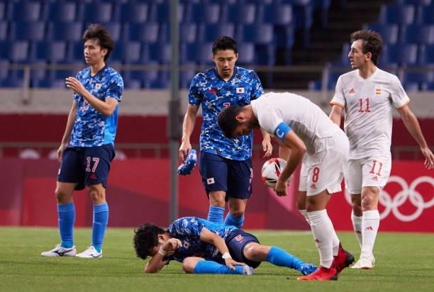 Koji Miyoshi of Japan injured on the ground during the Men's Football Semi-final Match between Japan and Spain at Saitama Stadium on August 3, 2021...