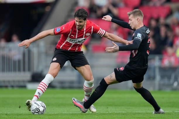 Marco van Ginkel of PSV, Charles of FC Midtjylland during the UEFA Champions League match between PSV v FC Midtjylland at the Philips Stadium on...