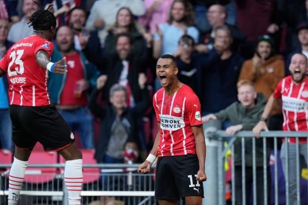 Cody Gakpo of PSV celebrates 3-0 with Noni Madueke of PSV during the UEFA Champions League match between PSV v FC Midtjylland at the Philips Stadium...